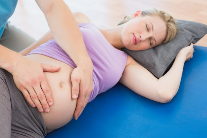 nugaros masažas nėštumo metu