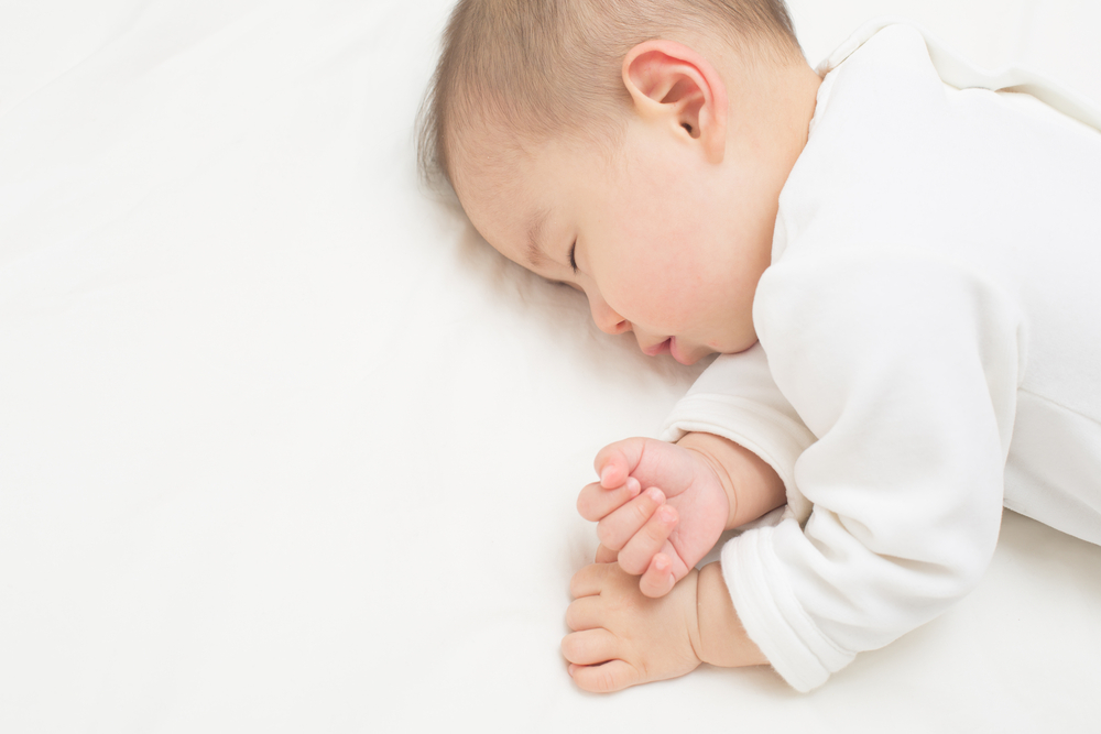 kūdikis miega po vakcinos